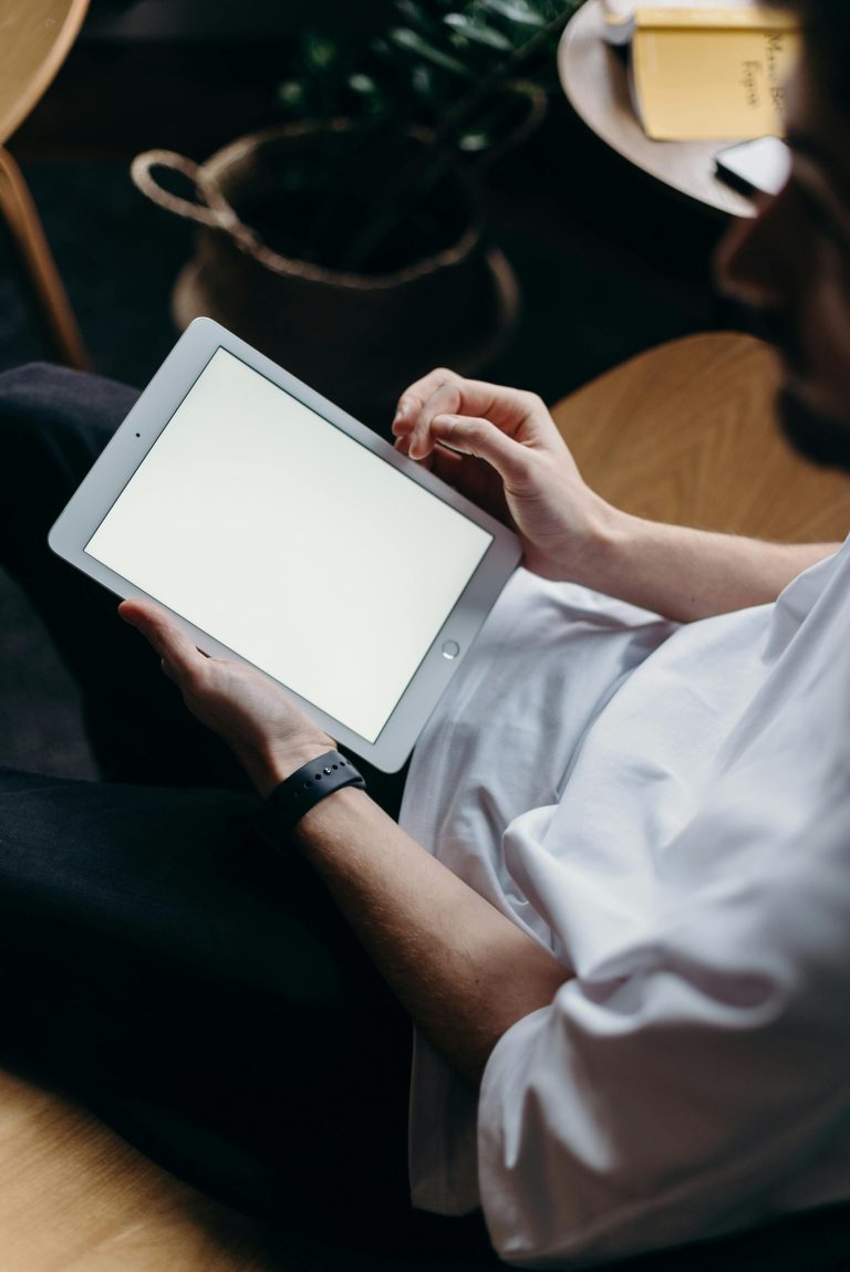man using a blank ipad