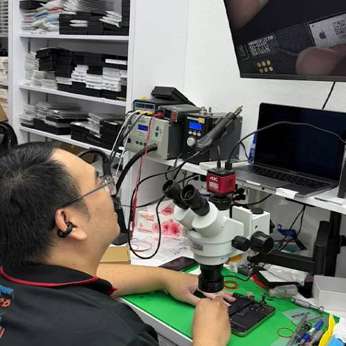 Microscope board-level repair during a Huawei Y7 Pro 2018 repair at Citri Mobile Singapore