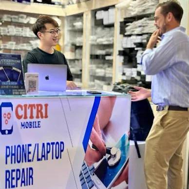Citri Mobile phone and laptop repair counter serving a Huawei Y7 Pro 2018 repair customer in Singapore