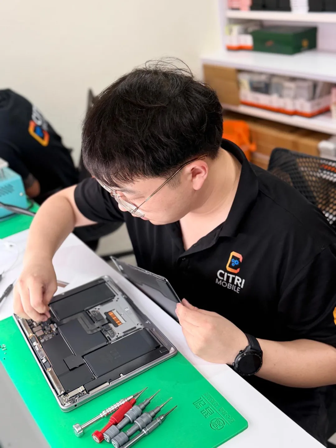 Citri Mobile technician repairing MacBook Pro 13-inch A2251 at our Singapore workshop